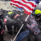 Rioters clash with police and security forces