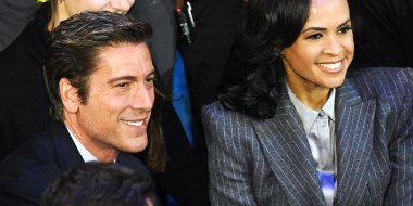 David Muir and Linsey Davis smile