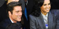 David Muir and Linsey Davis smile