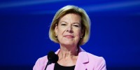 Tammy Baldwin smiles while speaking 